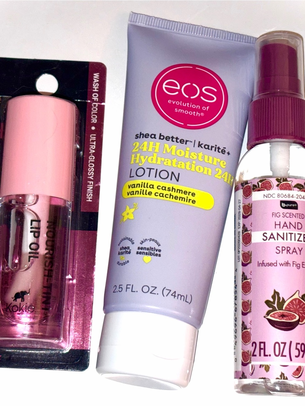 4 PC Lot: Kokie lip oil, eos vanilla cashmere body lotion fig hand sanitizer